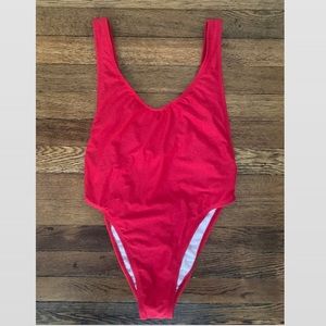 NWOT Dippin daisys one piece size S red can fit a medium. Have never worn